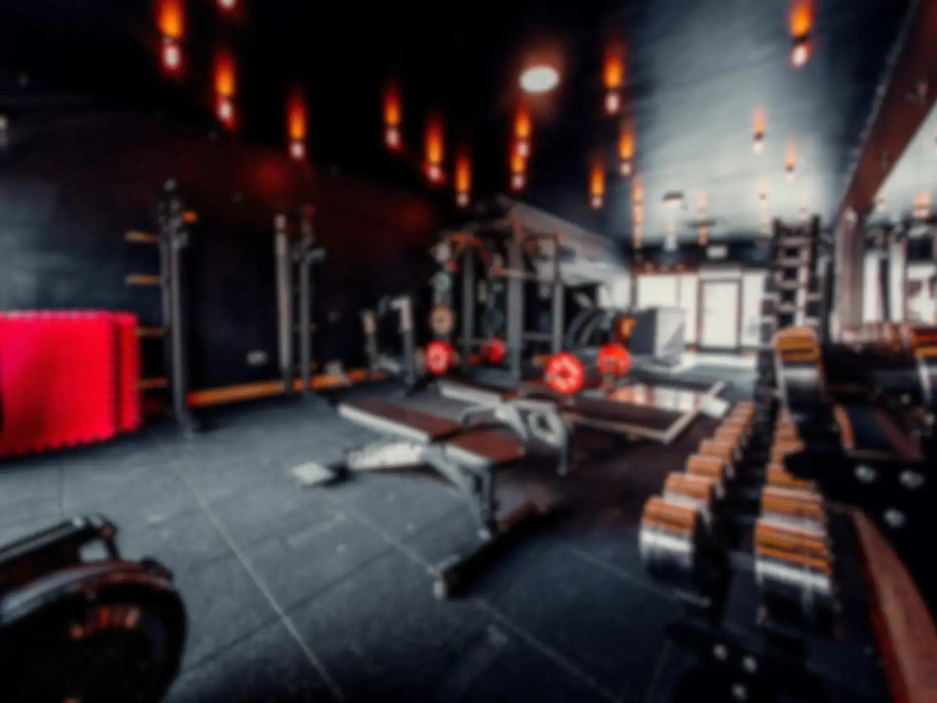 BTX personal training gym interior with dark atmospheric lighting - Hampstead North London